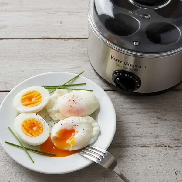 Perfectly cooked hard-boiled and poached eggs next to the Elite Gourmet Egg Cooker